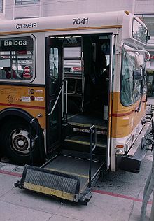 Open wheelchair lift on public bus